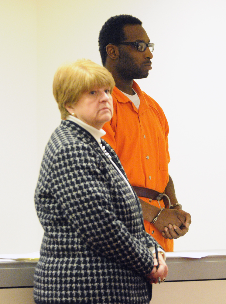 Defense attorney Pamela Ames stands with David W. Marble Jr. during his initial appearance on double murder charges on Wednesday at the Capital Judicial Center in Augusta.
