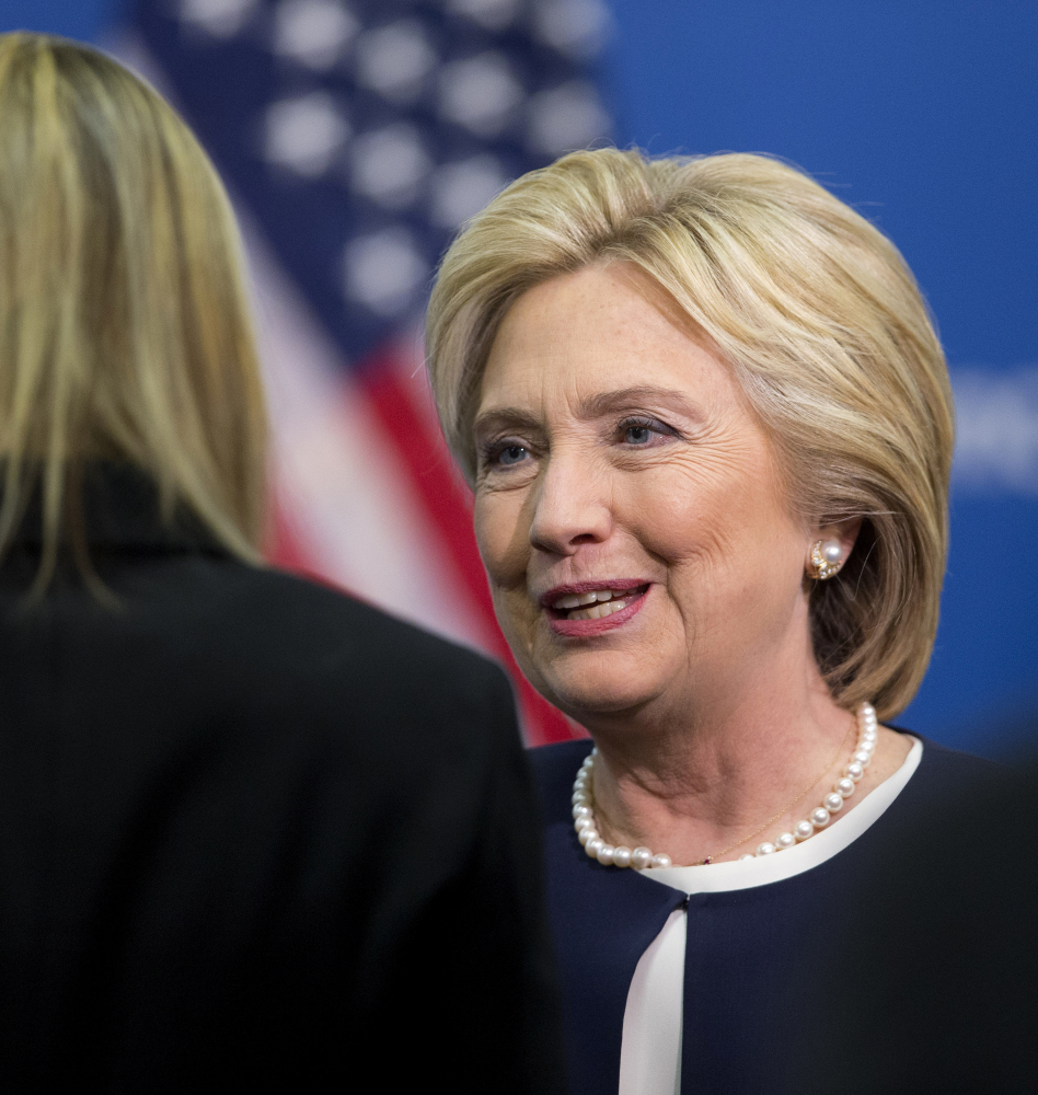 Democratic presidential candidate Hillary Clinton greets guests at the Atlantic Council Women’s Leadership in Latin America Initiative in Washington on Monday.