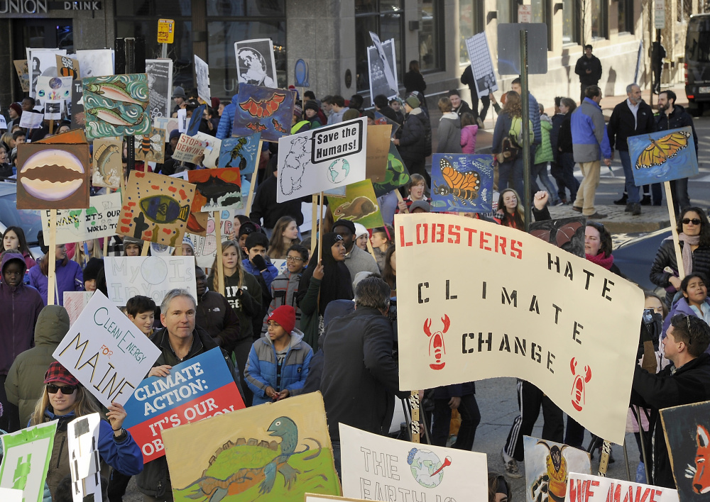 King Middle School students gather at Portland's City Hall Plaza this month to promote climate-change awareness.