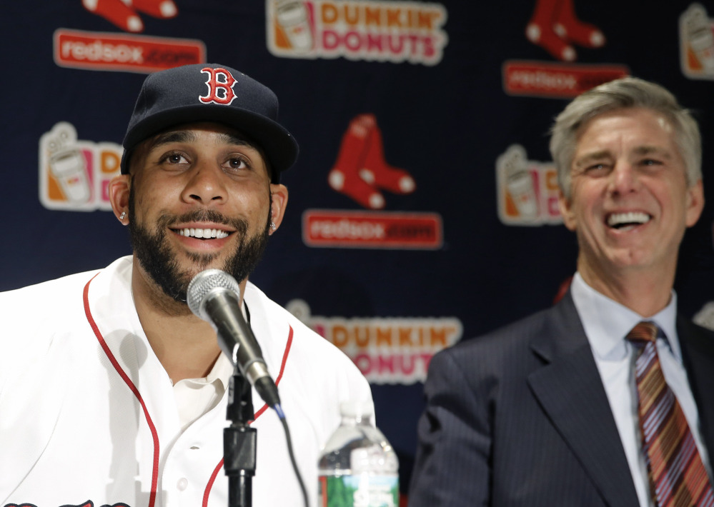 New Red Sox pitcher David Price smiles with President of Baseball Operations Dave Dombrowski at Friday’s news conference at Fenway Park announcing his signing of a seven-year contract worth $217 million. Red Sox owner John Henry said, “We’re going to see one of the best pitchers in baseball every five days.”