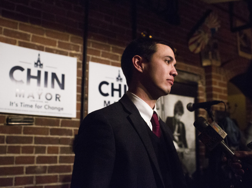 Ben Chin speaks with his supporters Tuesday night after losing the Lewiston mayoral runoff election against Robert Macdonald. He said he hasn't given much thought to his future in politics.
Whitney Hayward/Staff Photographer