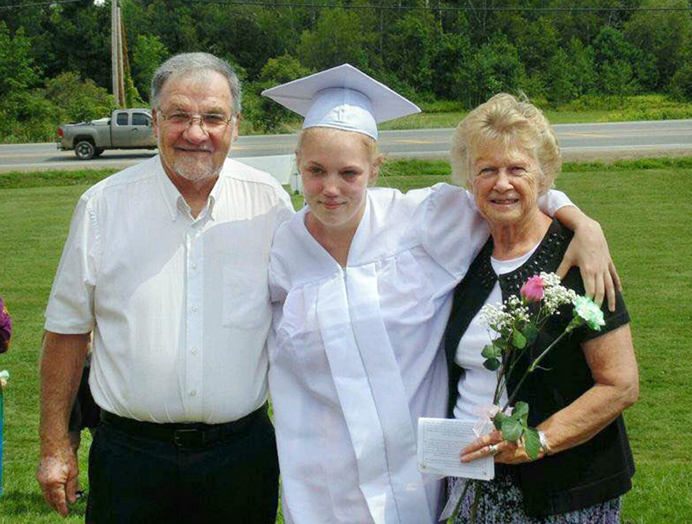 Tanika Hodges poses for a photo with her grandparents, Terry and Mary Hodges, on her graduation day from the Maine Academy of Natural Sciences in August. (Photo courtesy of Tanika Hodges)