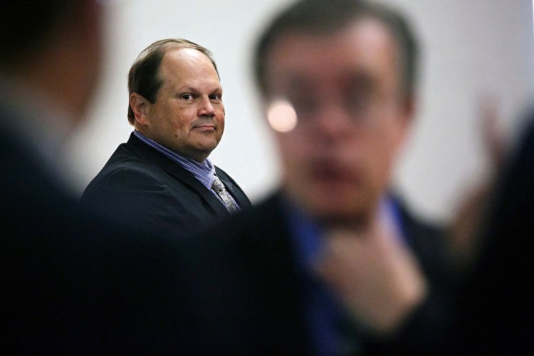 Eddie Tipton looks over at his lawyers before the start of his trial in Des Moines, Iowa, in this July 15, 20-15 file photo. The former security director of the Multi-State Lottery Association, accused of tampering with lottery drawings to rig jackpots in four states, was convicted of fraud in the attempt to claim a $16.5 million jackpot in Iowa. Investigators are now looking at payouts in 37 other states.