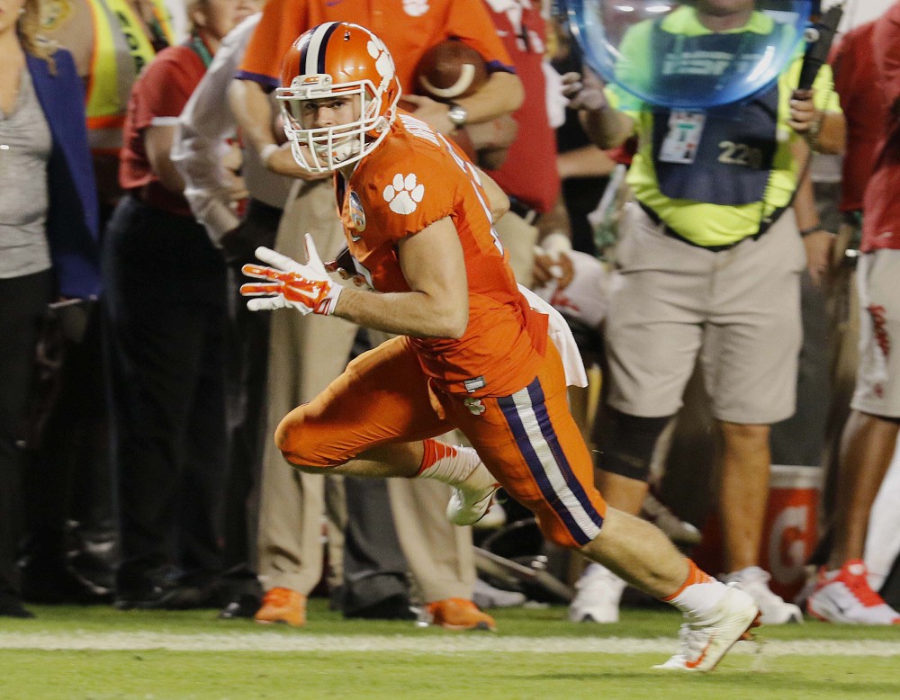 Clemson wide receiver Hunter Renfrow runs for a touchdown in the second half, putting his team on the way to a win in the Orange Bowl and a spot in the national championship game.