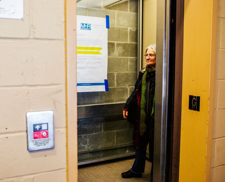 Timmi Sellers uses the elevator at the parking garage for Casco Bay Lines on Wednesday. The elevator will be out of service for five months, starting Monday.
Whitney Hayward/Staff Photographer