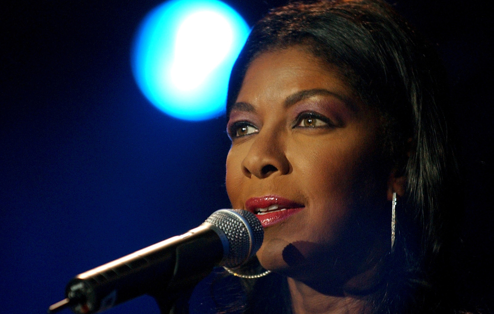 Natalie Cole performs in 2003 in Montreux, Switzerland. The daughter of jazz legend Nat King Cole, who carried on his musical legacy, she died Thursday night at Cedars-Sinai Medical Center in Los Angeles of complications from ongoing health issues, her family said.