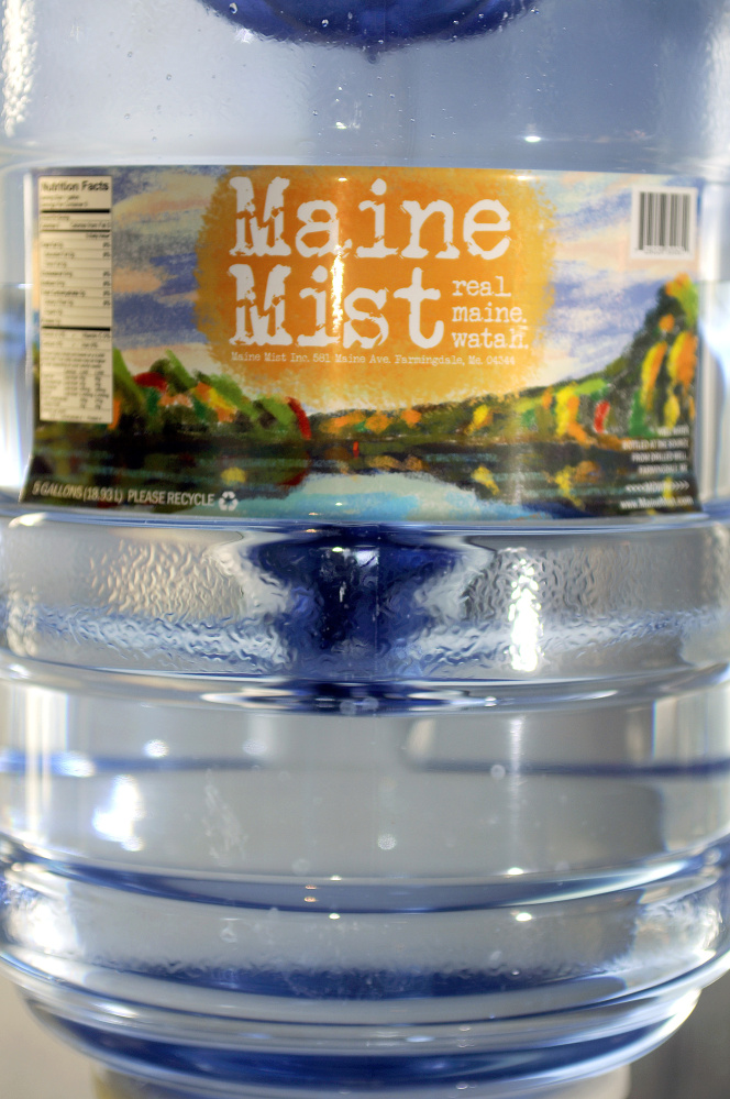 Ed and Deb Bowie are bottling and selling a line of water, Maine Mist, at their Farmingdale business, the Cobbossee Beverage Shop.
