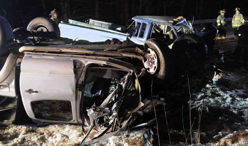 Firefighters check pickup trucks that collided on Route 9 in Chelsea, injuring three people Monday evening. All the victims had to be extricated from the vehicles, police said, to be treated for multiple, life threatening injuries.