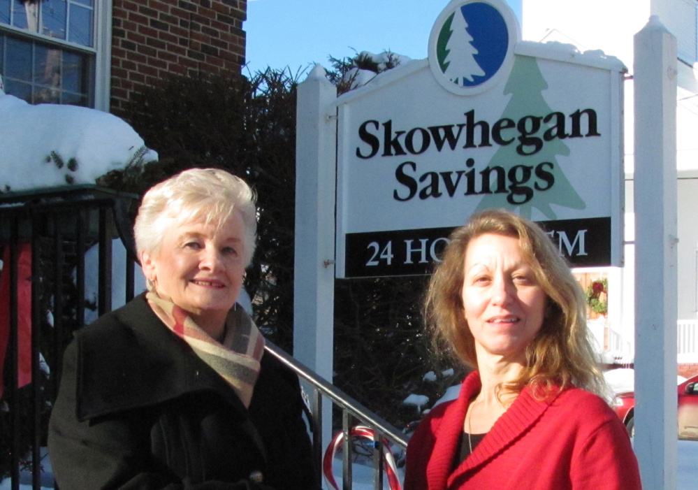 Contributed photo
RFA President Millie Hoekstra, left, received a grant from Dawn Field, manager of Skowhegan Savings Bank’s Rangeley Branch.