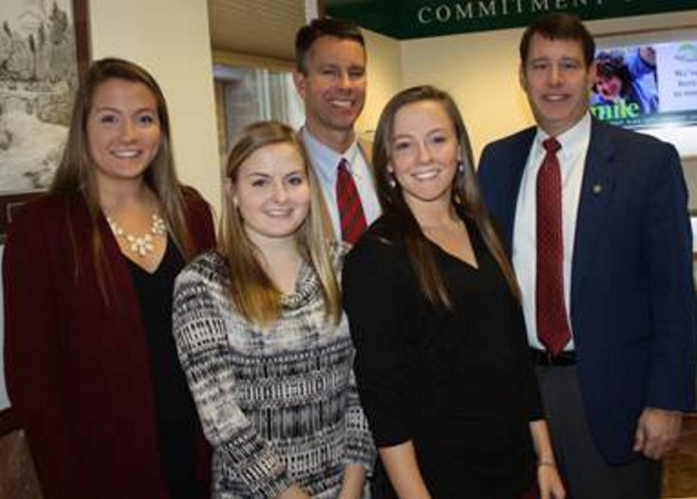 From left, are Hayley Quirion, Lindsey Quirion, Amos Byron, vice president and trust officer, Emily Quirion and Andrew Silsby, president and CEO of Kennebec Savings Bank.