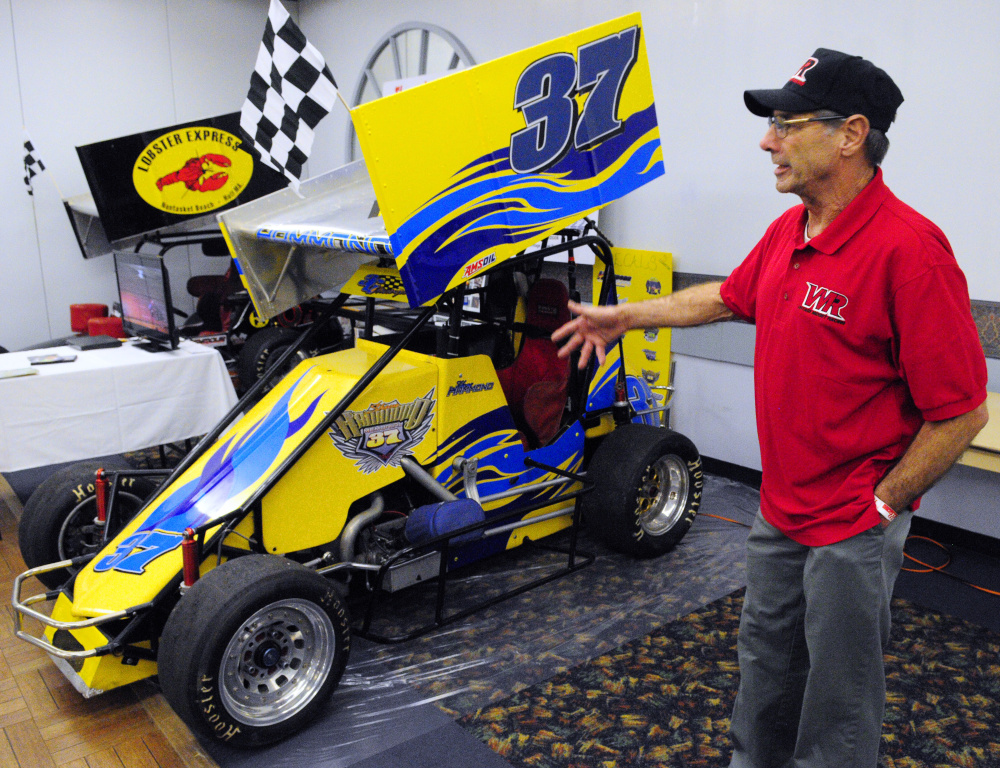 Bobby White, 69 of Scituate, Massachusetts, talks about vintage midget car racing during the Northeast Motorsports Expo on Friday in the Augusta Civic Center.