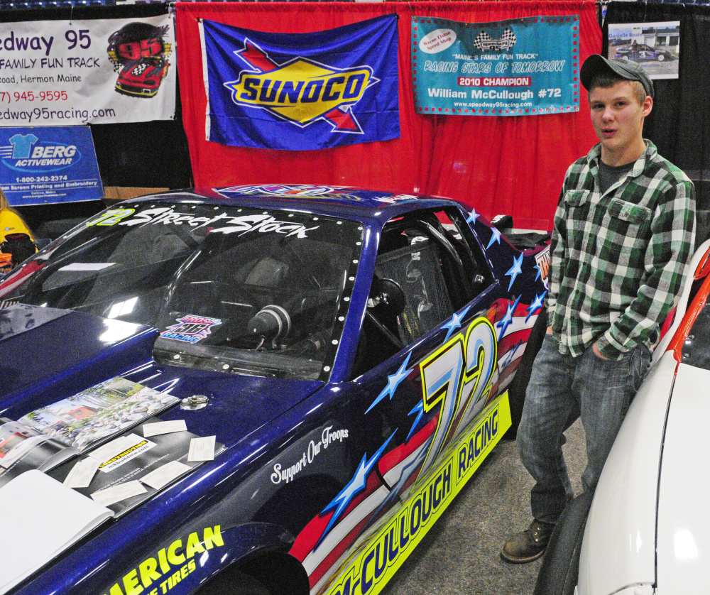 William McCullough, 17 of Kenduskeag, talks about his 1986 IROC Camaro that he’ll run in Street Stock race this year during the Northeast Motorsports Expo on Friday in the Augusta Civic Center.