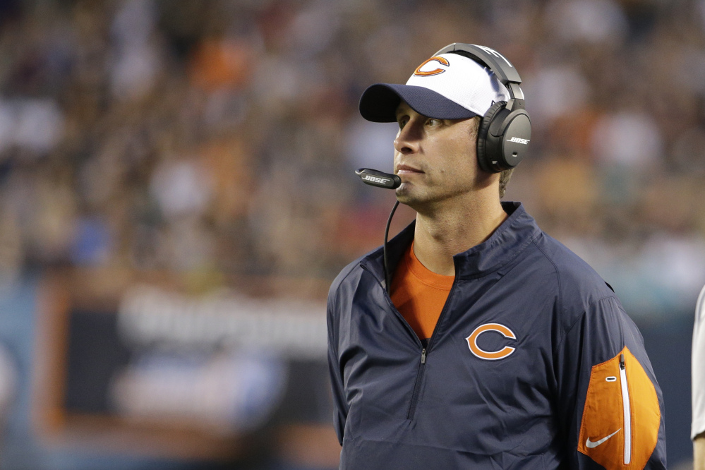 Chicago Bears offensive coordinator Adam Gase was hired by the Miami Dolphins Saturday as their coach.