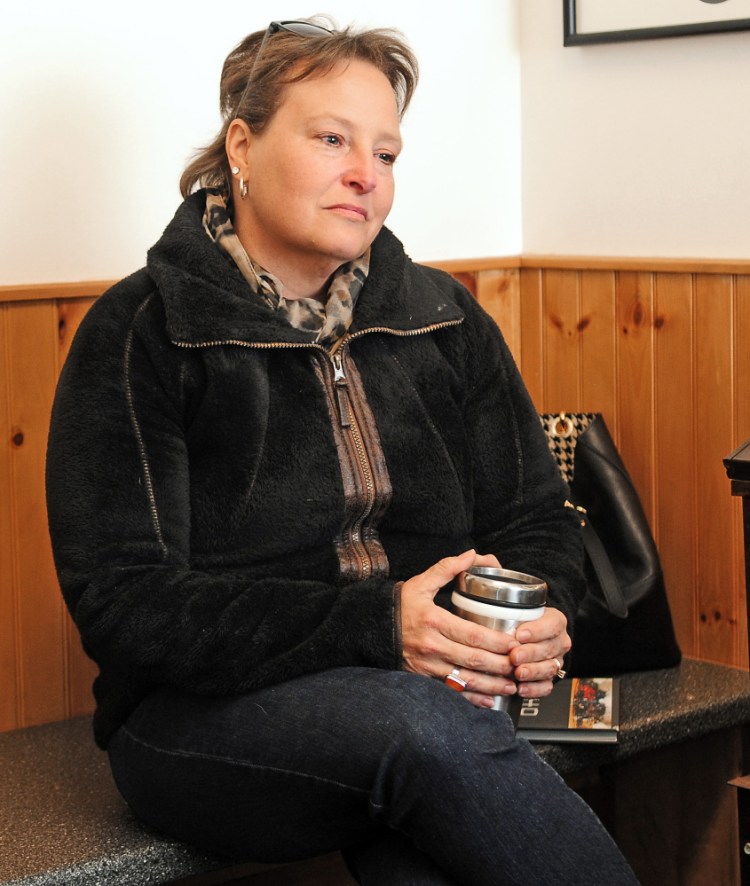 Susan Cloutier takes a break from answering questions Wednesday during an interview at United Fitness and Martial Arts in Winthrop.