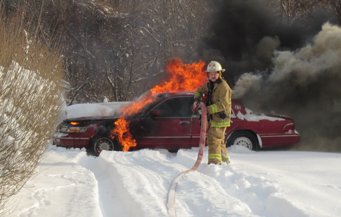 A red sedan was destroyed by fire Wednesday on Northern Avenue in Augusta.