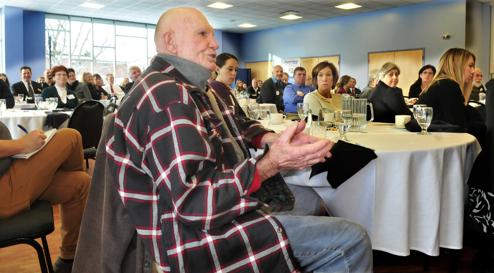 Russ Vesecky of Waterville asks Gov. Paul LePage a question during a Mid-Maine Chamber of Commerce business breakfast series at Thomas College in Waterville on Thursday morning.