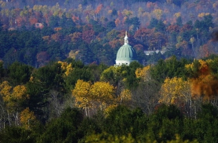 The State House dome is seen in front of Howard Hill in this 2007 view from Route 17 on Augusta’s east side, the other side of the Kennebec River.