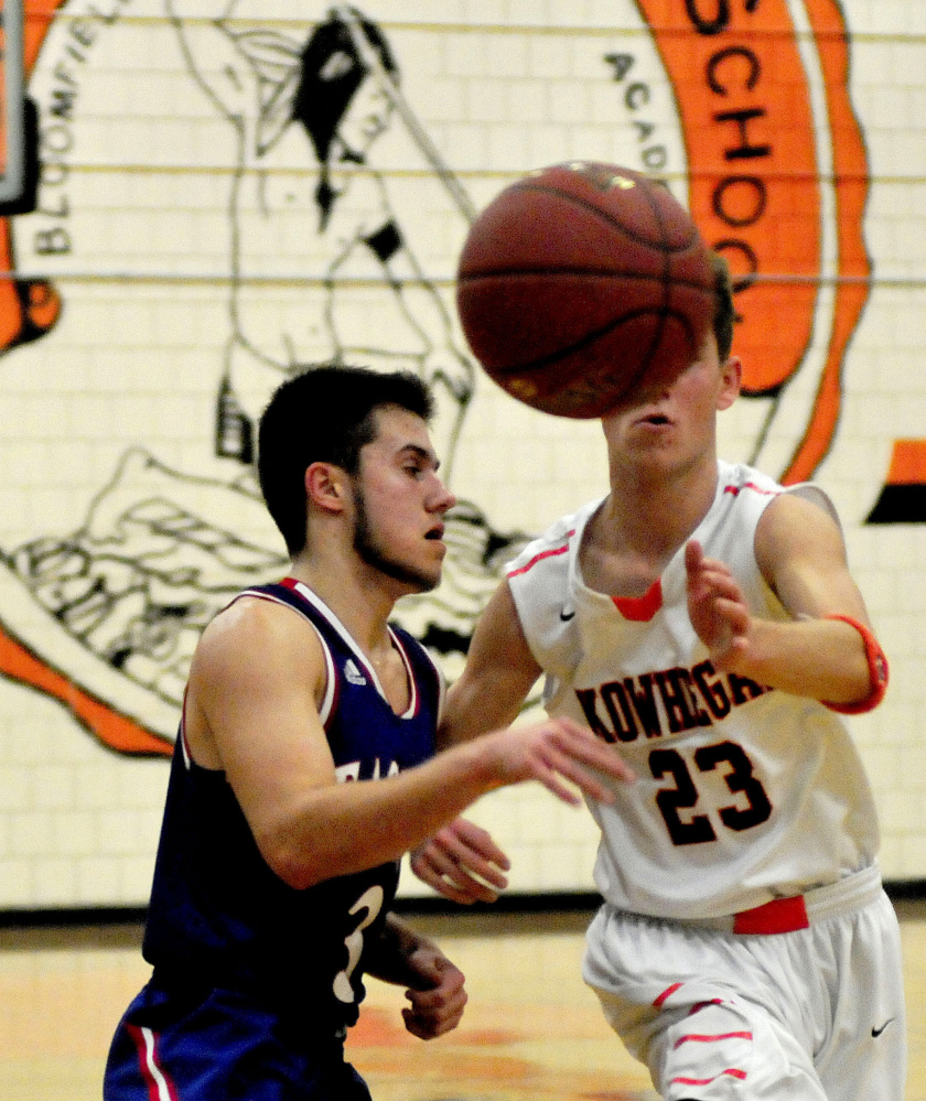 Skowhegan’s Brendan Curran looks to haul in a pass as Messalonskee’s Sawyer Michaud defends during a Kennebec Valley Athletic Conference Class A game Monday afternoon.