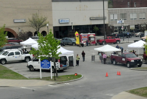 This area of The Concourse in Waterville, seen in May 2014, is where the farmers market sets up every Thursday afternoon from April to November along downtown Main Street. Colby College would like to buy the property to build a dormitory there.