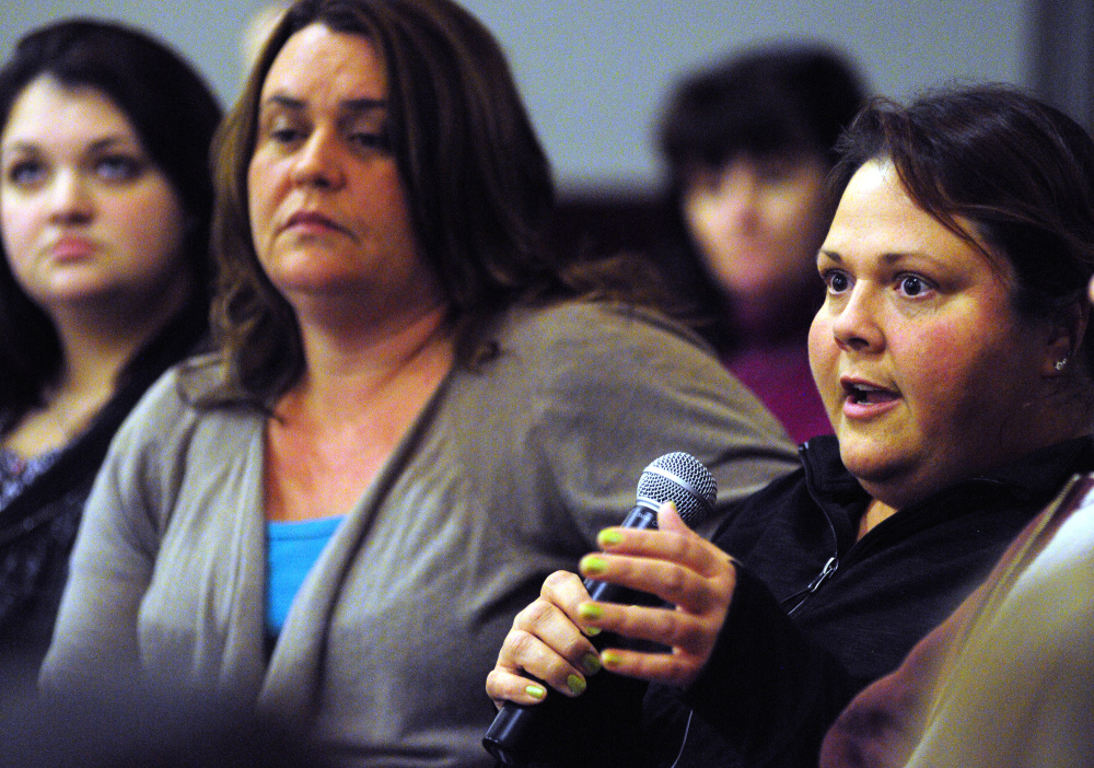 Jodi French, right, who works as an acuity specialist at Riverview Psychiatric Center, speaks on Tuesday during a meeting between Riverview workers and some state legislators at the University of Maine at Augusta.