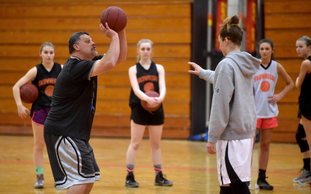 Skowhegan Area High School girls basketball coach Mike LeBlanc puts his team through drills during practice Wednesday.