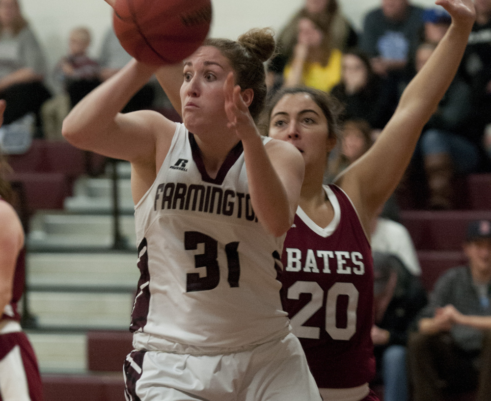 Contributed photo
University of Maine-Farmington senior Meghan Smith passes the ball in a game against Bates last season. Smith, a Boothbay graduate, is averaging 15.6 points and 10.9 rebounds per game for the Beavers this season.