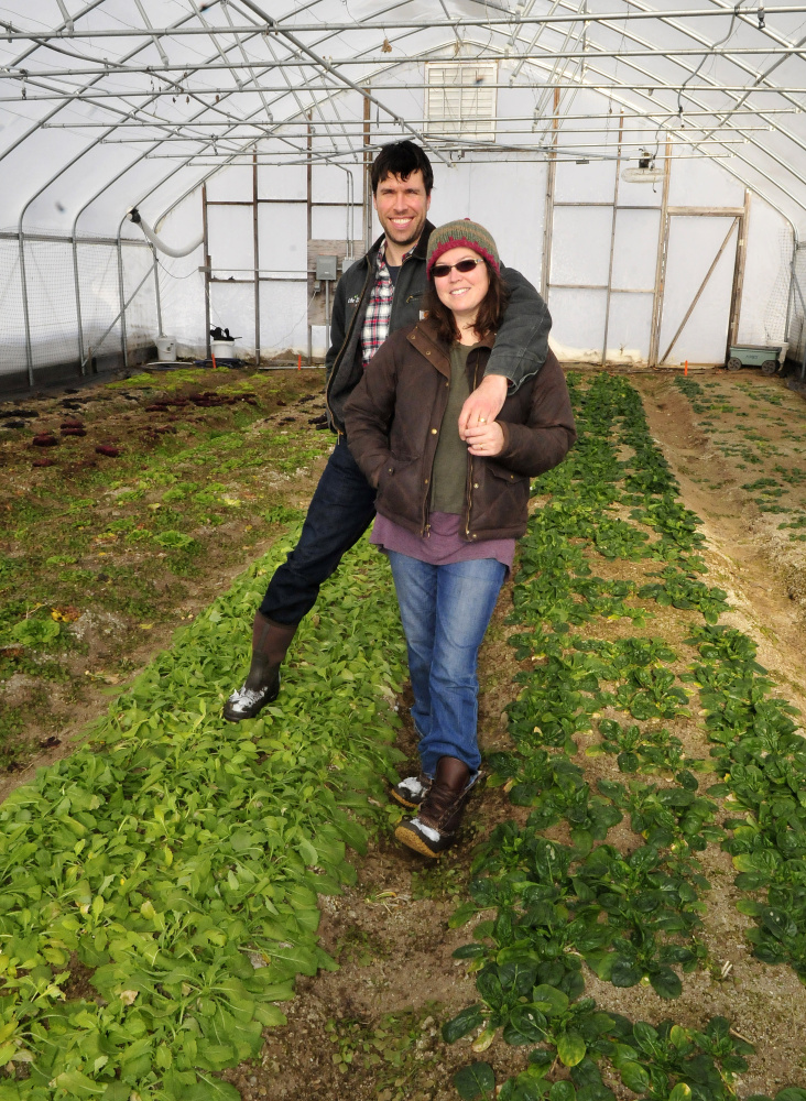 Cornville farmers Andrew and Ann Mefferd inside one of four greenhouses at their One Drop Farm on Wednesday. The Mefferds now also own “Growing for Market” magazine.
