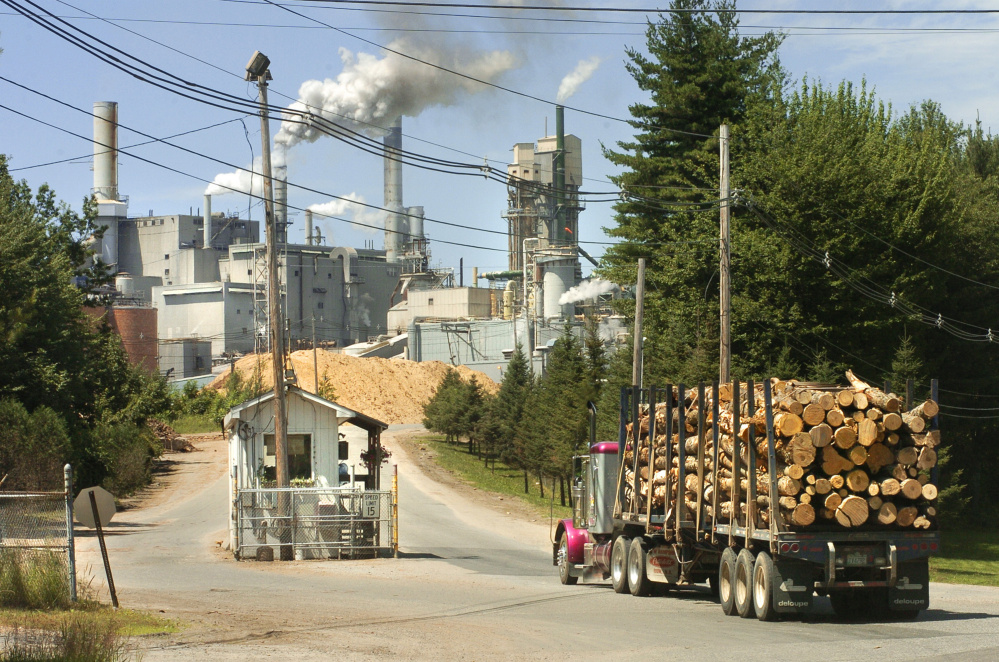 Verso Corp., owner of the Androscoggin Mill in Jay, seen in this file photo, is preparing to file for bankruptcy protection after it missed the grace period on two late loan payments. The mill laid off 300 workers over the past few months.