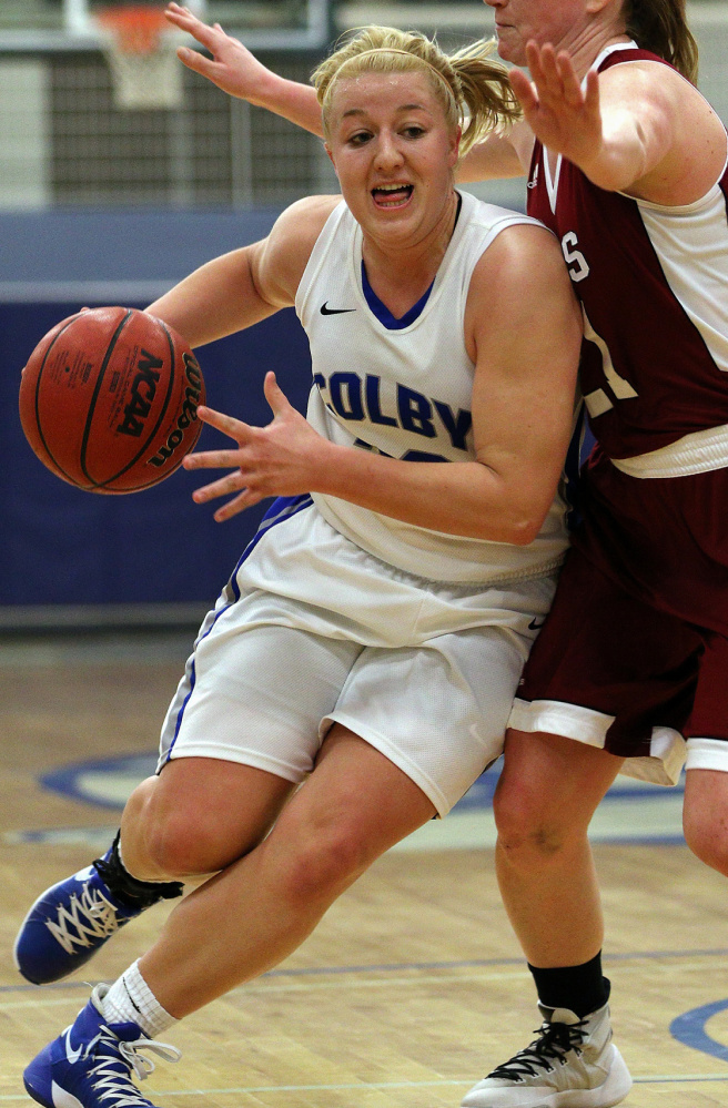 Carylanne Wolfington, of Hallowell, went over the 1,000-point barrier on Friday night at Trinity College. Wolfington, who is shown here during a game against Bates earlier this season, scored 11 points to give her 1,006 in her career. The Mules won 72-63.