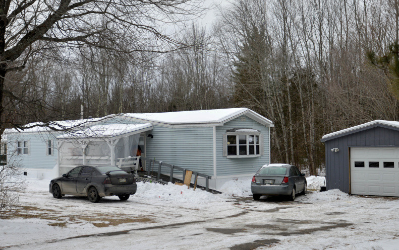 The residence of Kayla Stewart and Nicholas Blood on Norridgewock Road in Fairfield on Saturday. Stewart was arrested Friday and charged with murder after the remains of her newborn son were found in the garage earlier this month.