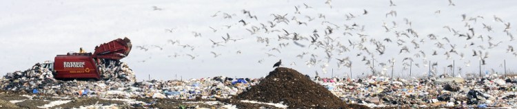 A Riverside Disposal truck dumps a load Tuesday at Hatch Hill Landfill in Augusta.