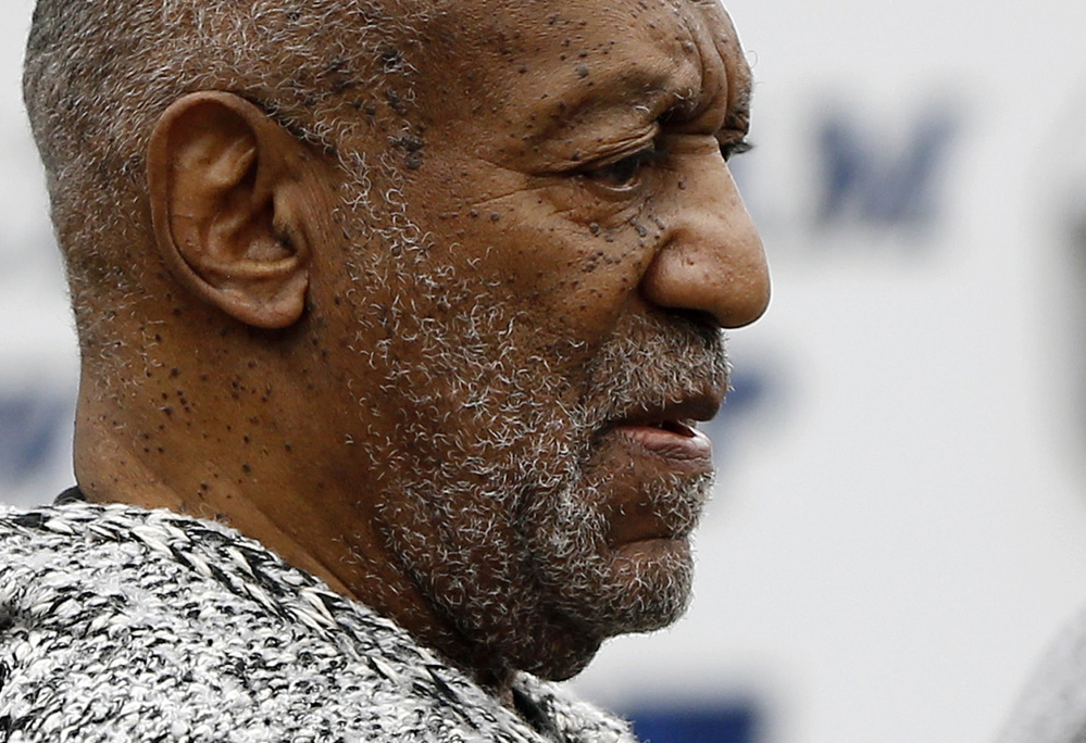 The Associated Press Bill Cosby leaves the Cheltenham Township Police Department where he was processed after being arraigned on a felony charge of aggravated indecent assault in Elkins Park, Pennsylvania. Cosby’s lawyers will be in court Tuesday, seeking to have the charges dismissed.