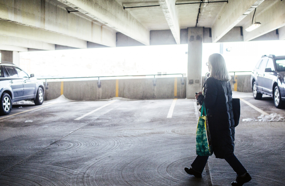Timmi Sellers walks to her car in the garage, where renovations are scheduled to start Monday.