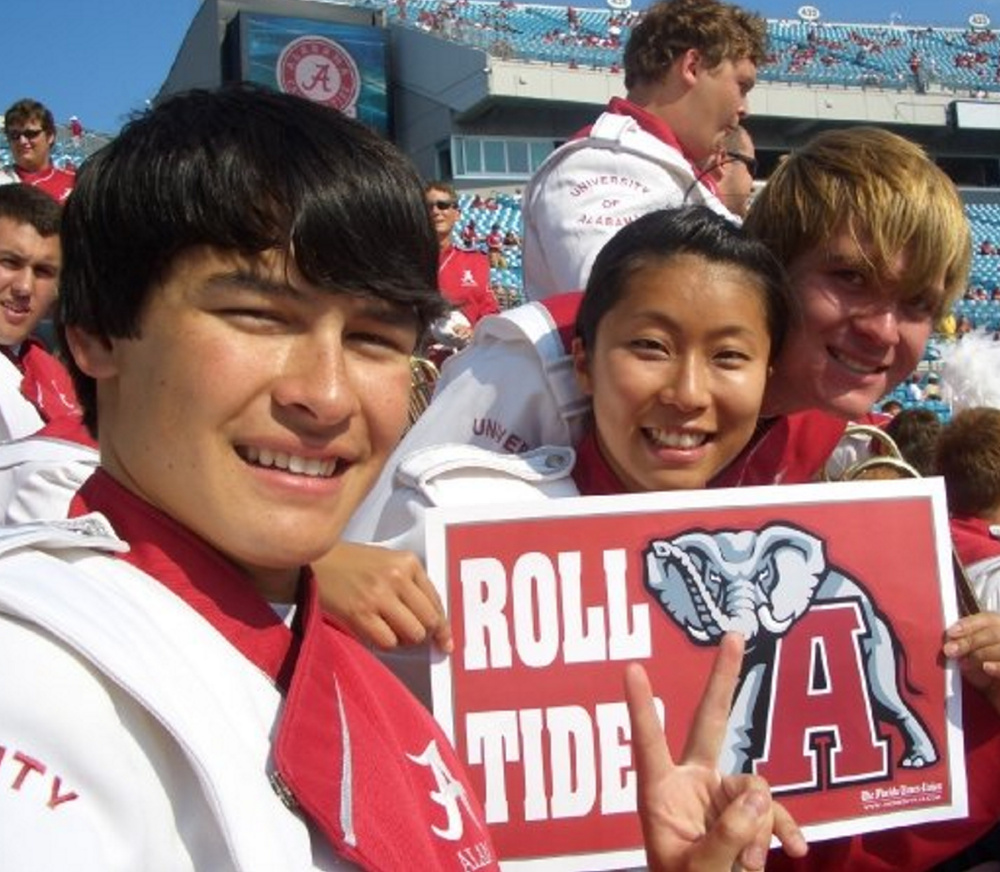 Norman Huynh, assistant conductor of the Portland Symphony Orchestra, graduated from Alabama and played in the school’s marching band. Courtesy photo