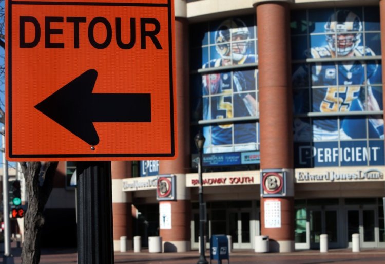 A detour sign for Riverfront construction stands in front of the Edwards Jones Dome on Tuesday, Jan. 12, 2016, in St. Louis. The Associated Press