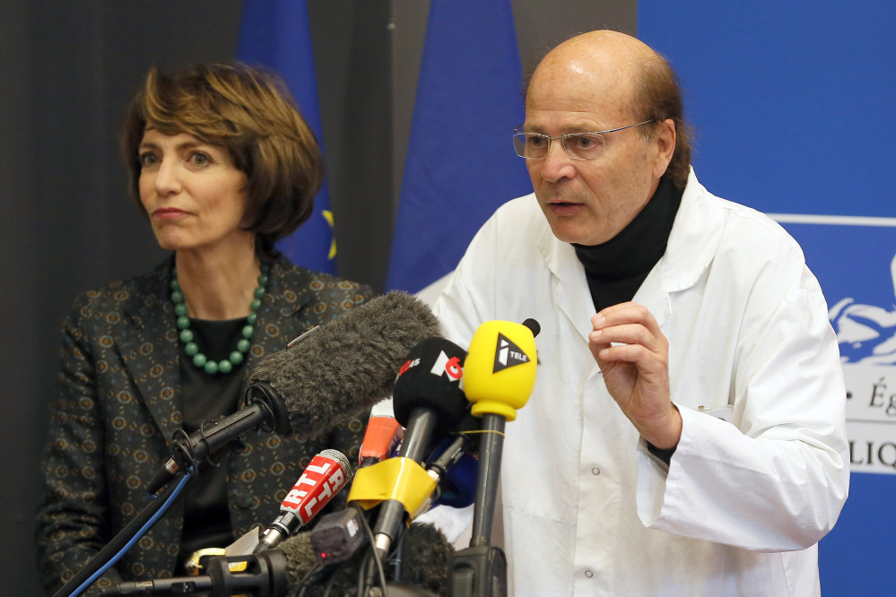 French Health Minister Marisol Touraine, left, and professor Gilles Edan, chief neuroscientist at Rennes Hospital, hold a news conference in Rennes, western France, on Friday. Six previously healthy medical volunteers were hospitalized – including one man who has since died – after taking part in a botched drug test at the Biotrial lab in western France, the French Health Ministry said.
