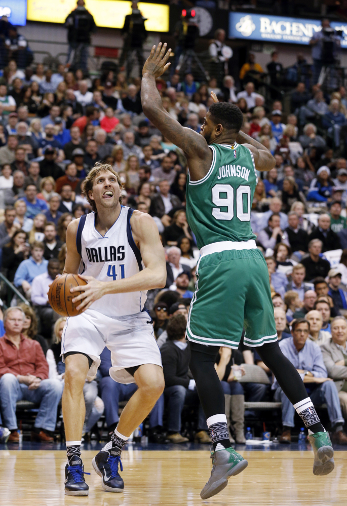 Mavericks forward Dirk Nowitzki was tough on the Celtics down the stretch, scoring 14 points in the fourth quarter and seven more in overtime.