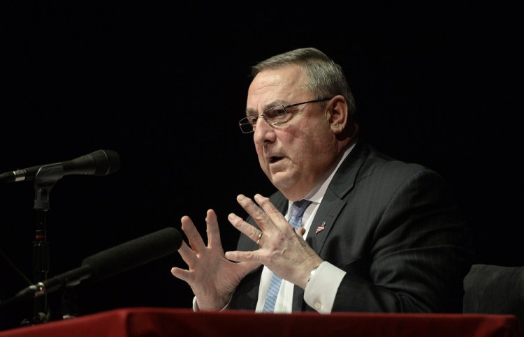 Gov. Paul LePage speaks at Windham High School on Jan. 19. . He urged the audience to vote their state legislators out of office in November if they don’t follow through on their campaign promises.
