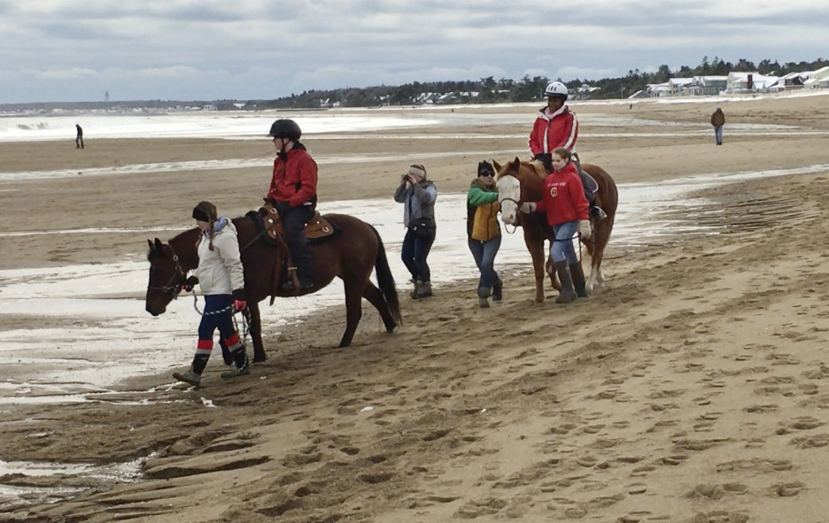 Guided horseback riding on Old Orchard Beach is among the activities for children at the annual Fire and Ice Burn Survivors Winter Camp, largely run by volunteers from fire departments.
Susan Kimball photo