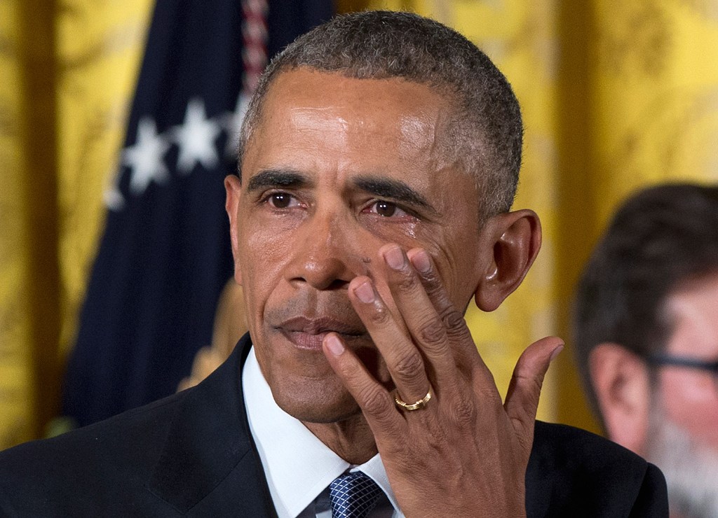 President Barack Obama wipes away tears from his eyes as he speaks in the East Room of the White House in Washington on Tuesday about steps his administration is taking to reduce gun violence. On stage with him were people whose lives have been changed by the gun violence. 