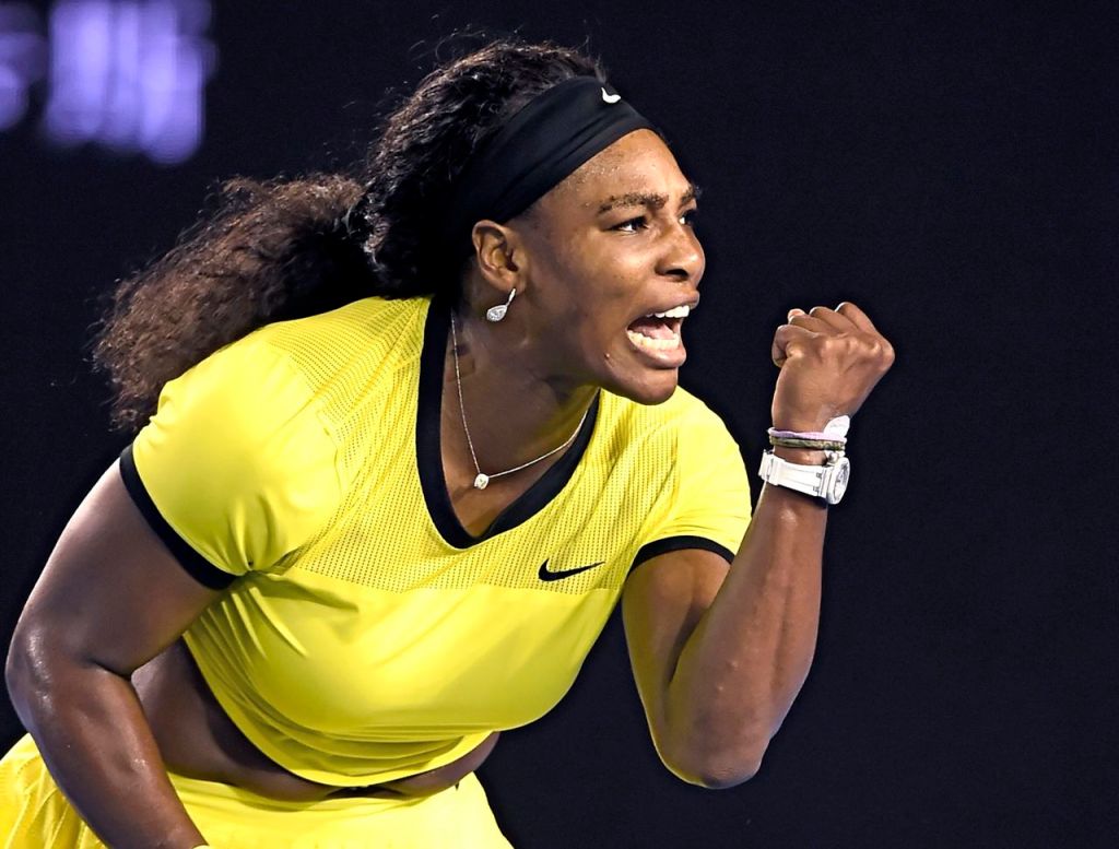 Serena Williams reacts after winning a point against Agnieszka Radwanska during their semifinal match at the Australian Open tennis championships in Melbourne. The Associated Press