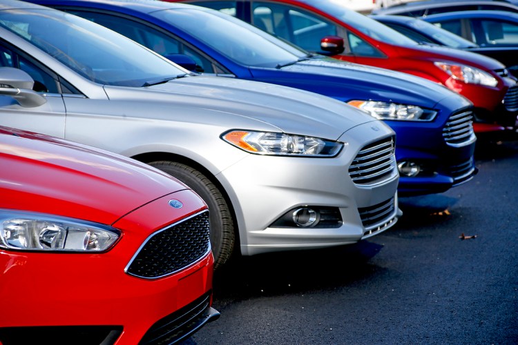 New 2015 Ford Fusions await buyers on the sales lot at Butler, Pa. , dealership. Ford was the best-selling brand for the sixth straight year, with sales of just over 2.5 million vehicles. The Associated Press