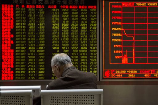 A display board at a brokerage in Beijing shows the plunge in the Shanghai Composite Index Thursday. Chinese stocks nosedived Thursday, triggering the second daylong trading halt of the week and sending other Asian markets sharply lower as investor jitters rippled across the region. The Associated Press
