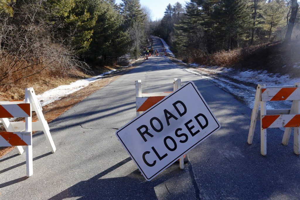 A section of Merrill Road in Pownal, near the Freeport town line, was closed on Monday until a culvert washed out in Sunday's storm could be repaired. 
Derek Davis / Staff Photographer