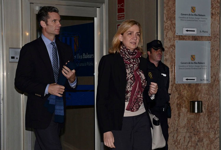 Spain's Princess Cristina, right and her husband Inaki Urdangarin, leave the courtroom after appearing in a corruption trial on January 11.