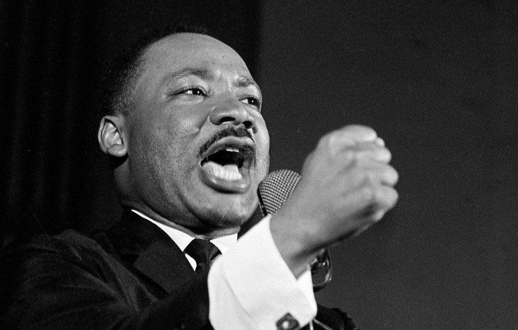 Dr. Martin Luther King Jr. delivers a speech in Selma, Alabama, Feb. 12, 1965. King was engaged in a battle with Sheriff Jim Clark over voting rights and voter registration in Selma. 