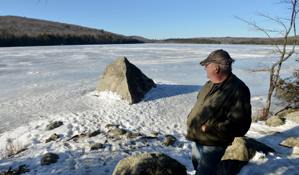 John Terstegen, of Skowhegan, takes in the afternoon sunshine Tuesday as he fishes at Lake George Regional Park on the Canaan and Skowhegan town line.