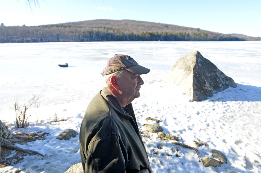 John Terstegen, of Skowhegan, takes in the afternoon sunshine Tuesday as he fishes at Lake George Regional Park on the Canaan and Skowhegan town line.