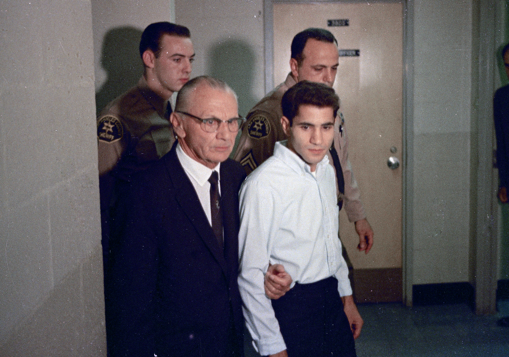 This June 1968 file photo shows Sirhan Sirhan, right, accused assassin of Sen. Robert F. Kennedy with his attorney Russell E. Parsons in Los Angeles.