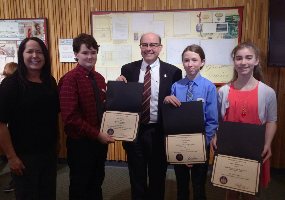 Contributed photo From left are Mali Dana, representing the Penobscot Nation and one of the judges; Riley Sullivan, first place winner; Secretary of State Matt Dunlap; and Avery Henningson and Emma Hutchinson, who tied for second.